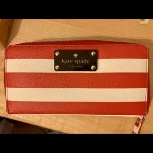 Red and white stripe large Kate Spade wallet.